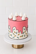 Cartoon-Style Birthday Cake - pink comic art drip cake with meringue peaks