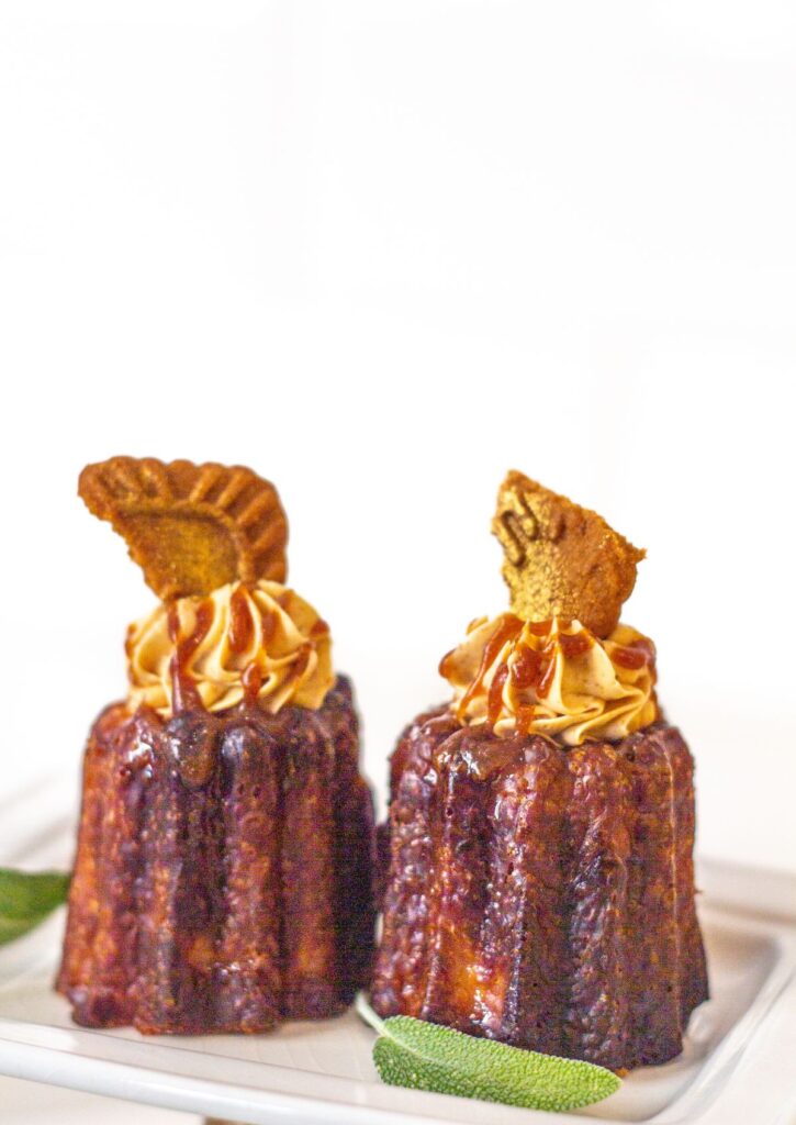Canelé - vanilla cream topping with caramel drizzle on white plate