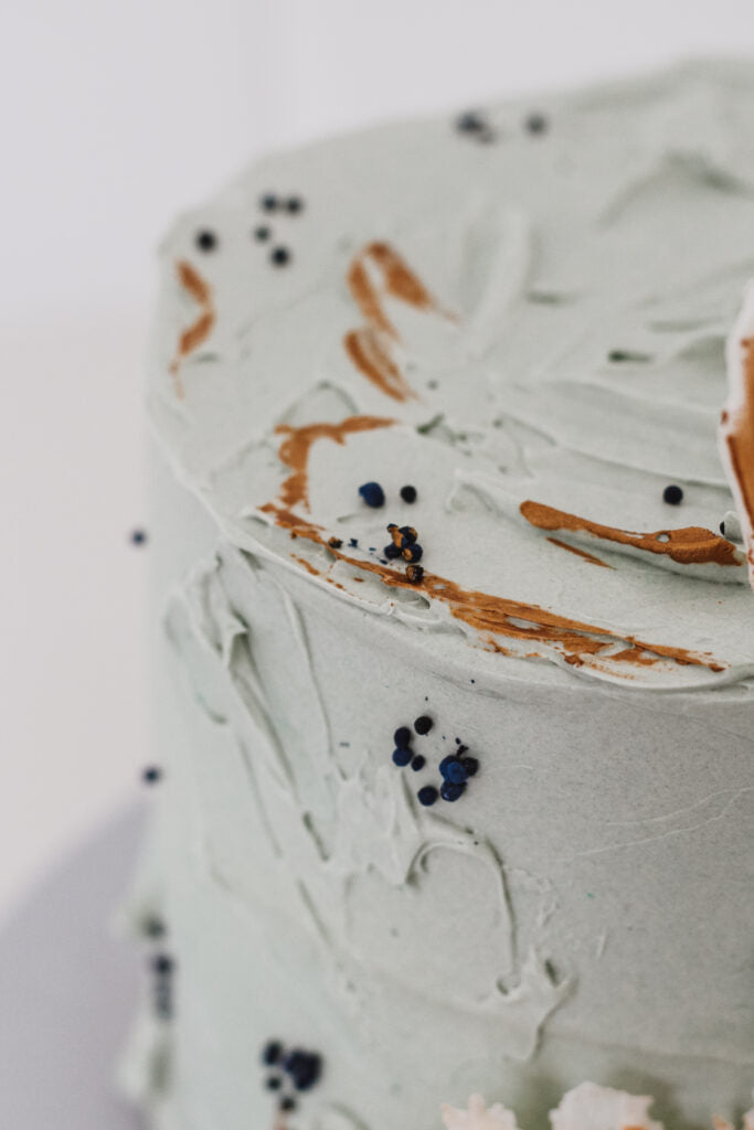 Birthday Cake Thea - close up of white chocolate sail decorations