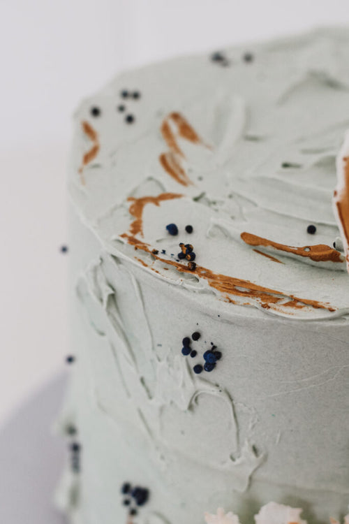 Birthday Cake Thea - close up of white chocolate sail decorations