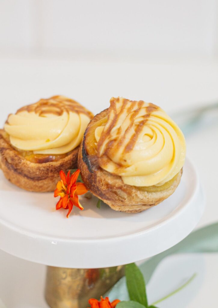 Pasteis de Nata - white chocolate mousse topping version on white cake stand
